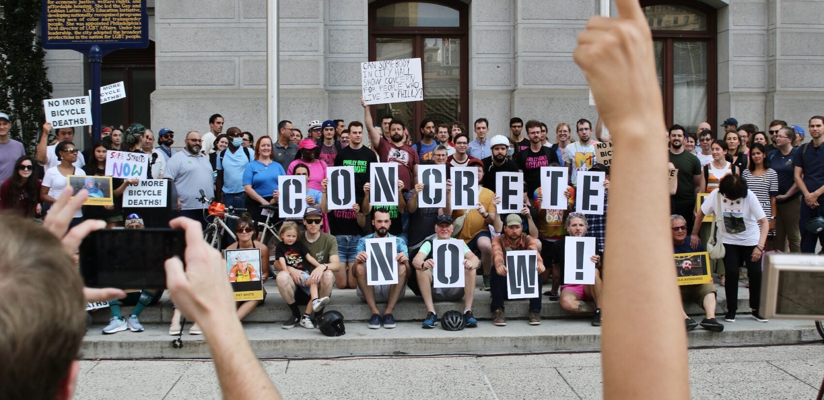 Cyclists and activists rally at City Hall