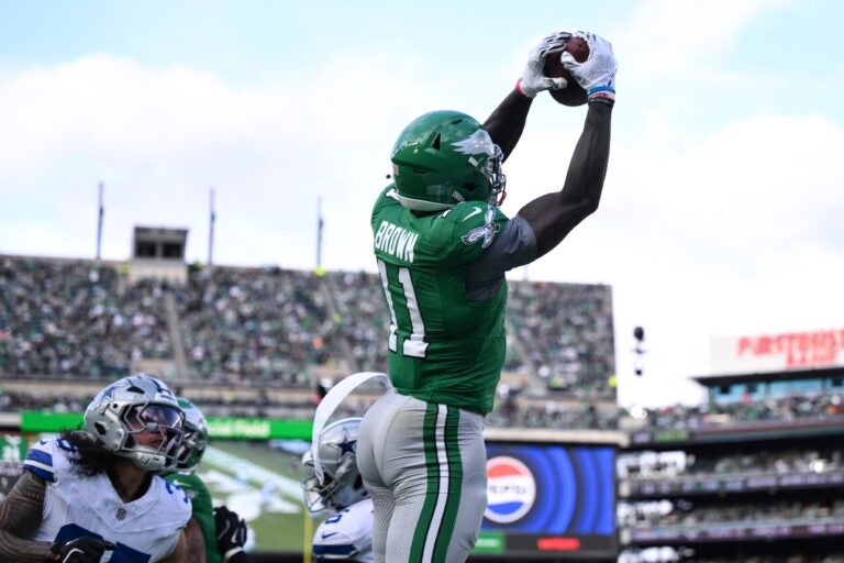 A.J. Brown catches a football while jumping