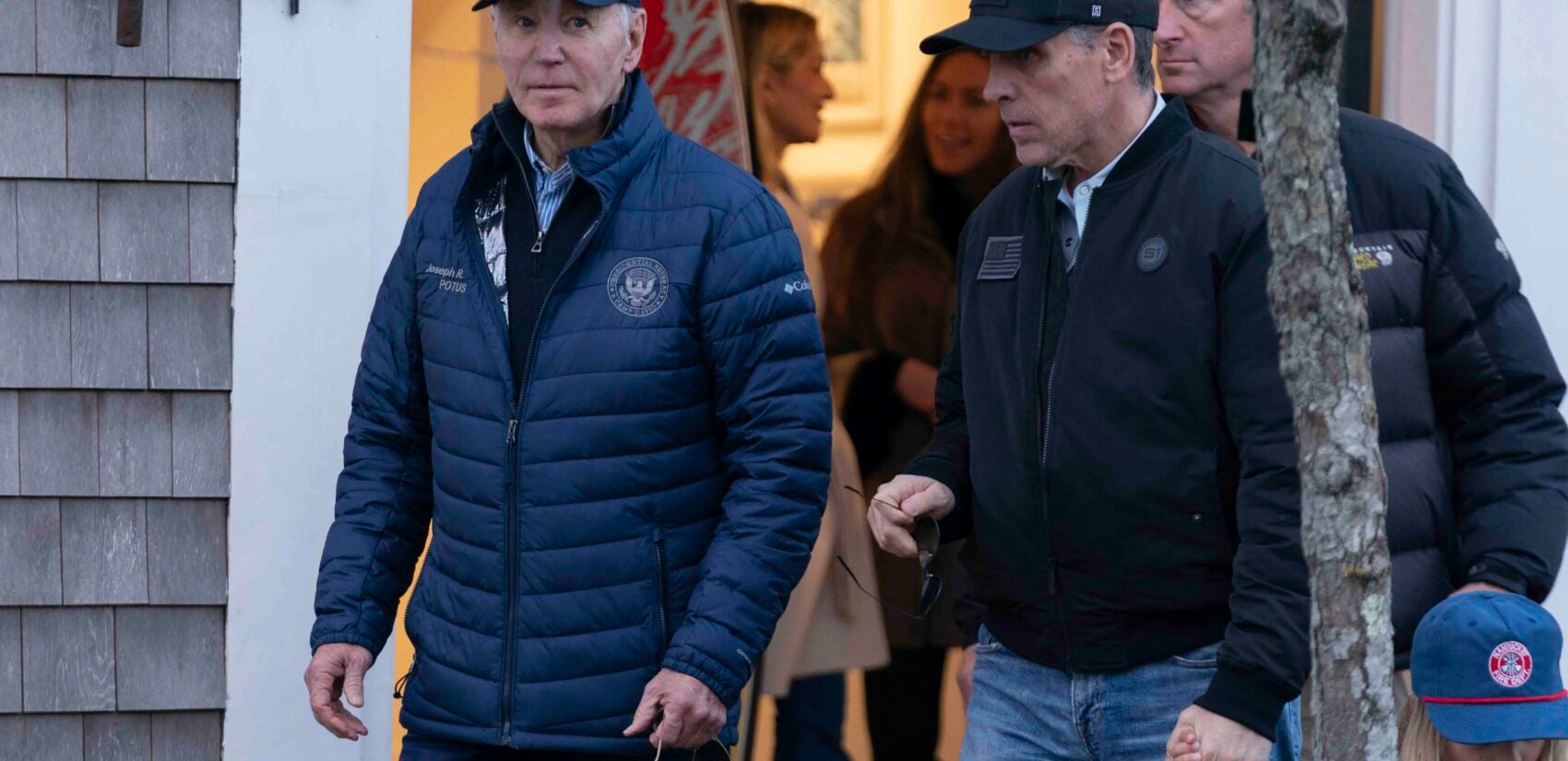 President Joe Biden and son Hunter Biden walk in downtown Nantucket Mass., Friday, Nov. 29, 2024. (AP Photo/Jose Luis Magana)