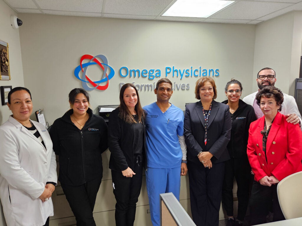 The staff at Omega Physicians pose for a photo