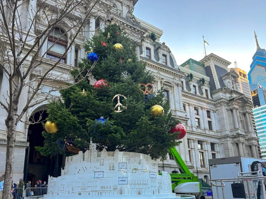 a tree with decorations at City Hall