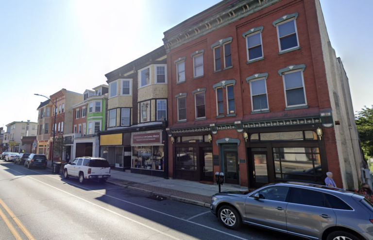 Businesses line a city street