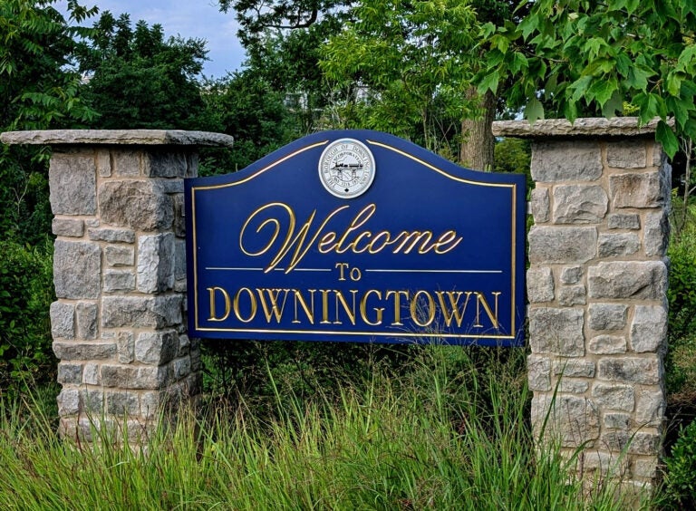 A sign reads Welcome to Downingtown