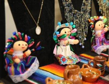 dolls and ceramics on a table