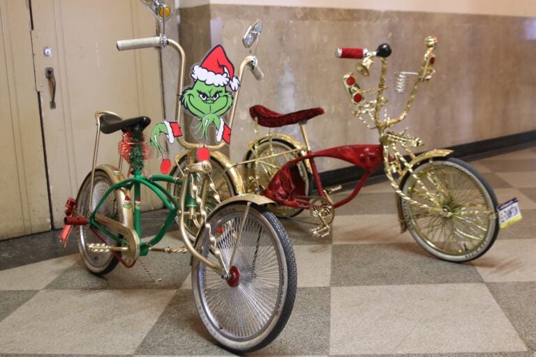 two bikes, one with a Grinch face