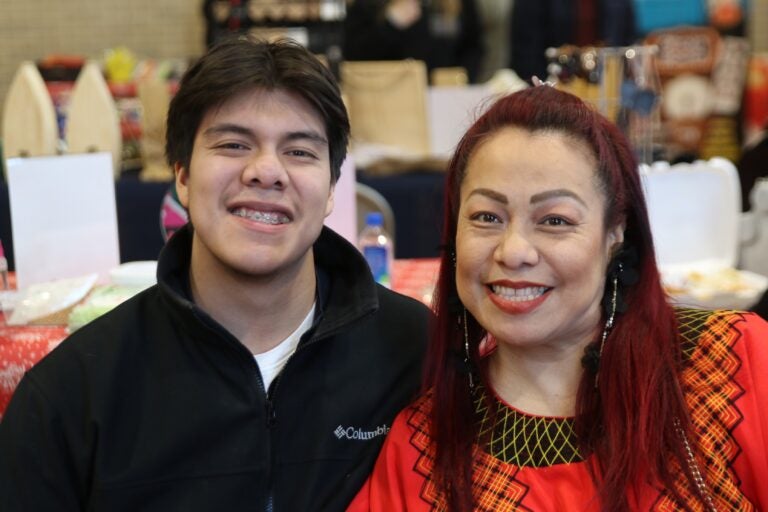 Jorge Reyes and Claudia Peregrina smile