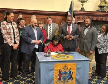 Cherelle Parker signs legislation as other look on