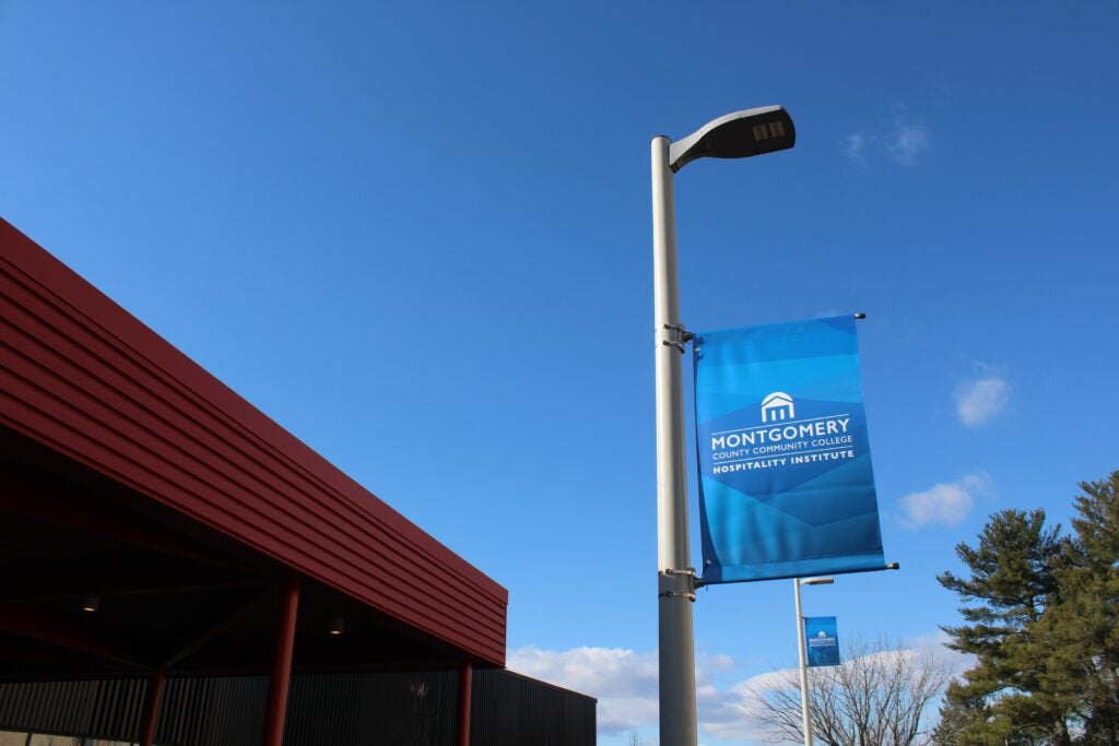 a sign on a pole for Montgomery County Community College