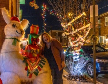 Zoe Fox with her beloved holiday llama