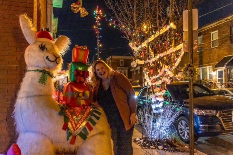 Zoe Fox with her beloved holiday llama