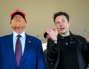 President-elect Donald Trump listens to Elon Musk as he arrives to watch SpaceX's mega rocket Starship lift off for a test flight from Starbase in Boca Chica, Texas, on Nov. 19. (Brandon Bell/Pool via AP)