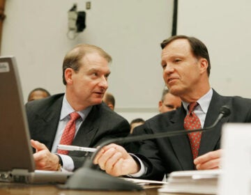 Paul Atkins, left, talks to then SEC Chair Christopher Cox during a House Financial Services Committee hearing on Capitol Hill in Washington, D.C., on June 26, 2007. Atkins was then an SEC commissioner, and he has now been picked by President-elect Trump as the next head of the agency. (Mark Wilson/Getty Images/Getty Images North America)