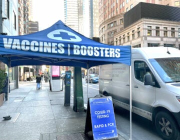 A mobile medical station in New York City makes it convenient to get an updated COVID-19 vaccine. In the U.S., only 1 in 5 eligible individuals has rolled up their sleeve for this latest vaccine version. (Deb Cohn-Orbach/UCG//Universal Images Group Editorial via Getty Images)