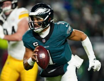 Philadelphia Eagles quarterback Jalen Hurts (1) runs the ball during the second half of an NFL football game against the Pittsburgh Steelers on Sunday, Dec. 15, 2024, in Philadelphia