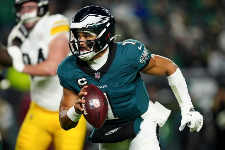 Philadelphia Eagles quarterback Jalen Hurts (1) runs the ball during the second half of an NFL football game against the Pittsburgh Steelers on Sunday, Dec. 15, 2024, in Philadelphia