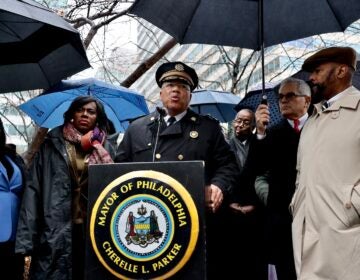 Philadelphia Police Commissioner Kevin Bethel (center) joins Mayor Cherelle Parker in Dilworth Park outside City Hall to address a weekend of violence that ended with four people dead