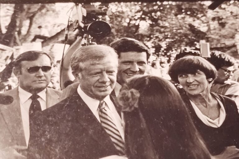 President Jimmy Carter shakes the hand of would-be WHYY News reporter Susan Phillips as her mother, Bertha, looks on.