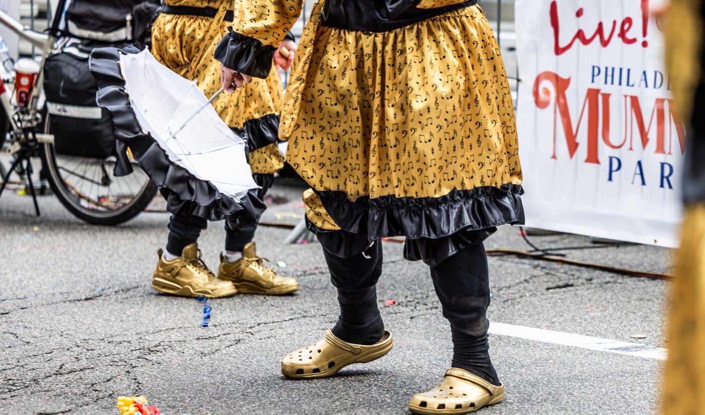 Mummers with golden shoes