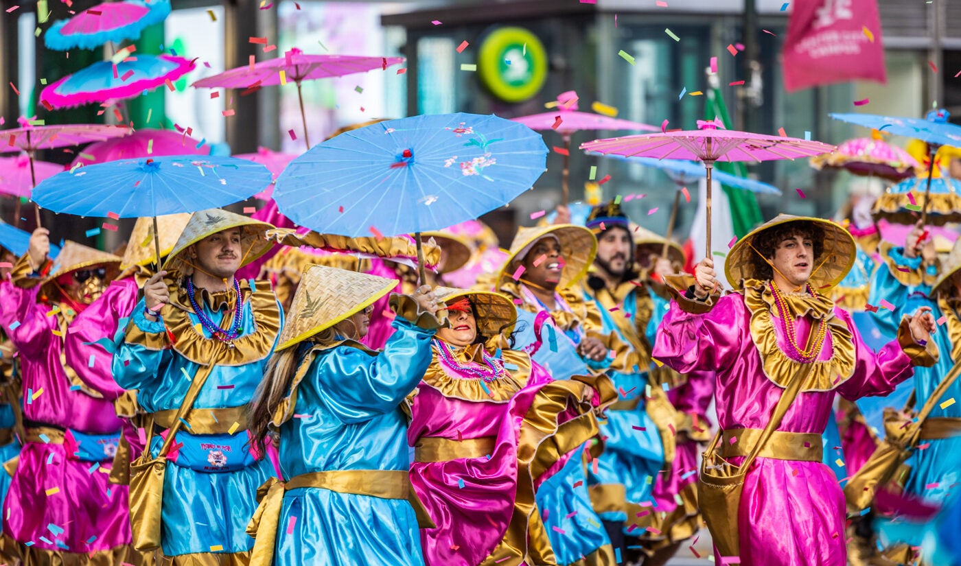 Confetti falls on Mummers