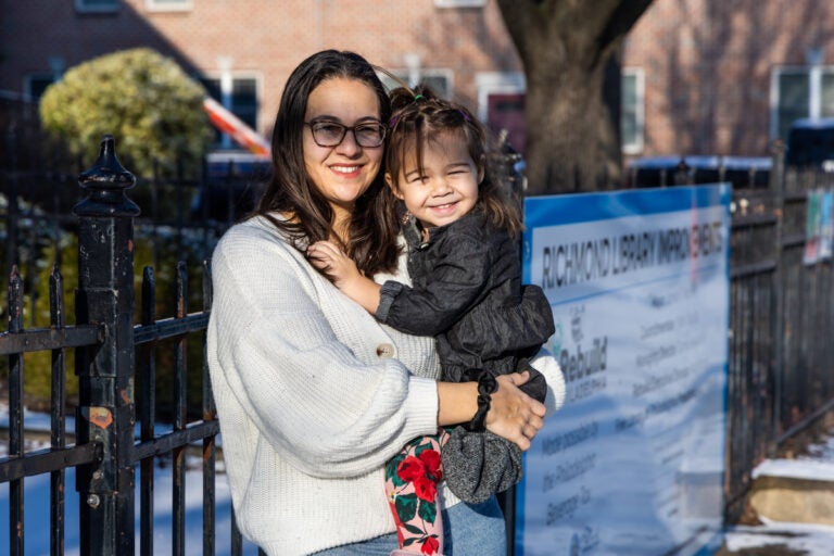 Hadar Spector and her daughter smile