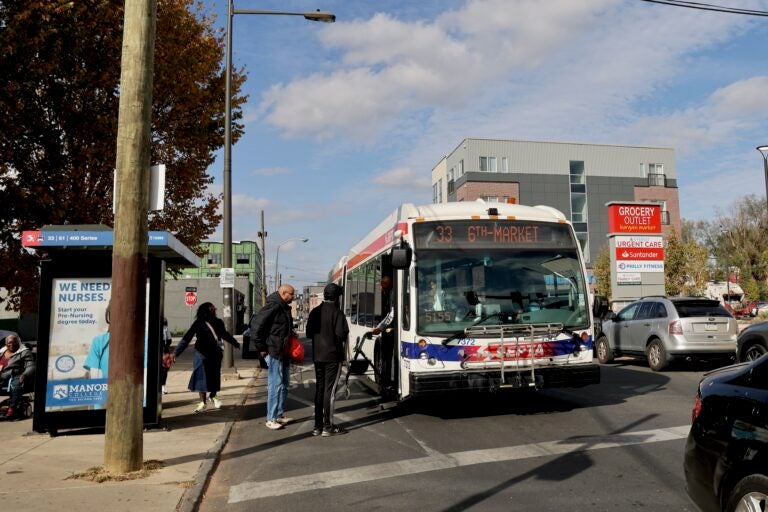 people board a SEPTA bus