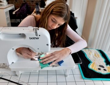 Iris Van Orden works on a quilt