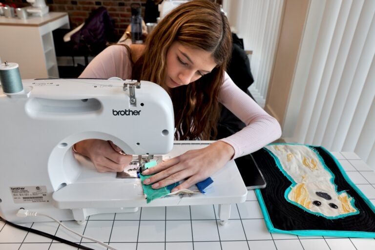 Iris Van Orden works on a quilt