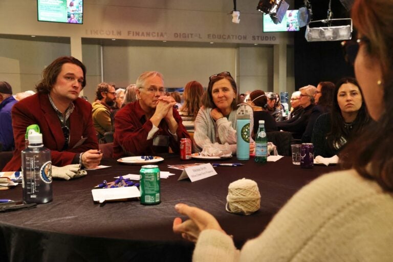 Melissa Smith leads a table discussion