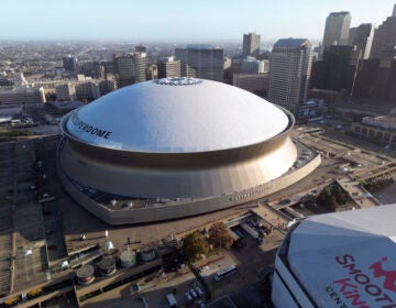 An aerial overall exterior general view of Caesars Superdome, Sunday, Dec. 15, 2024, in New Orleans. (AP Photo/Tyler Kaufman)