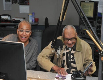 WHYY's own Bobbi Booker, then serving as a producer, with Bob Perkins at WRTI studio. (Photo credit: Martin Regusters)
