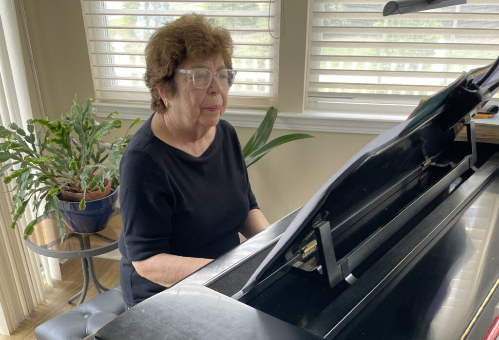 Ena Barton plays piano