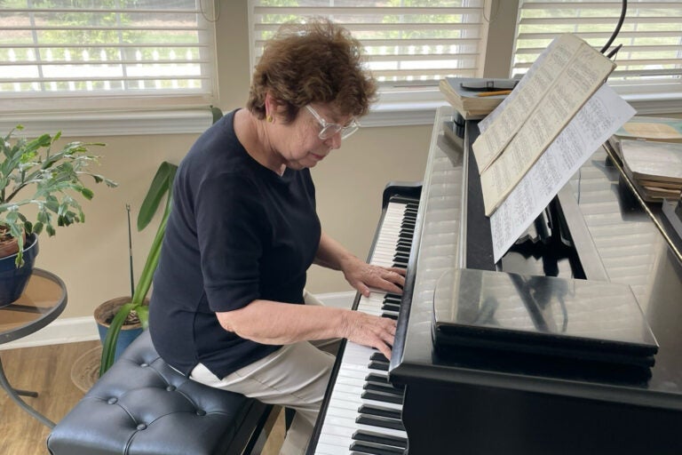 Ena Barton plays piano