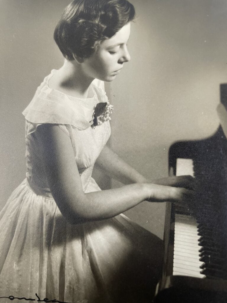 Ena Barton plays piano, age 13