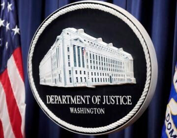 The seal of the DOJ