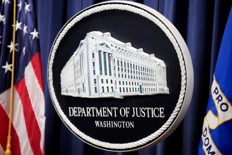 The seal of the DOJ