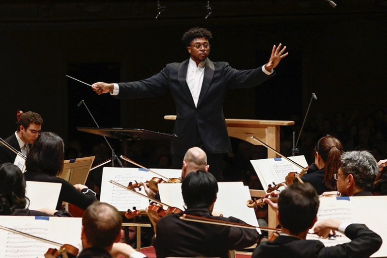 Na'Zir McFadden leading an orchestra