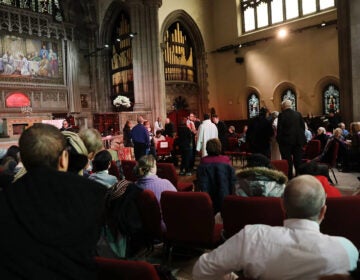 people sit in a church