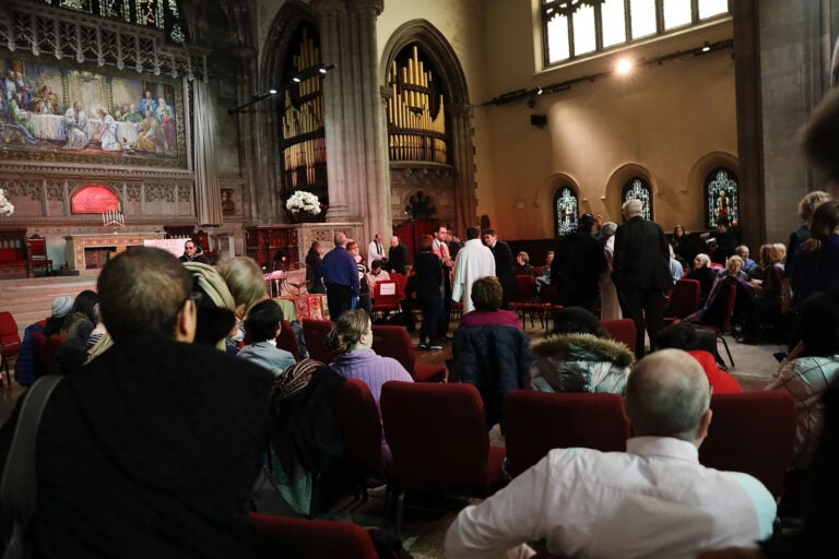 people sit in a church