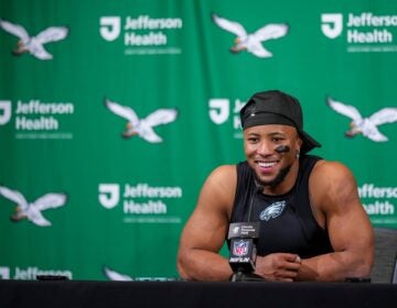 Saquon Barkley sits and smiles