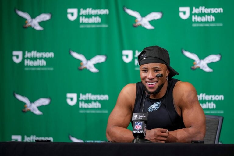 Saquon Barkley sits and smiles