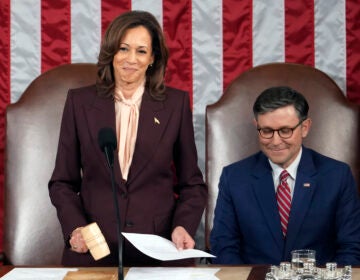 Vice President Kamala Harris reads the results