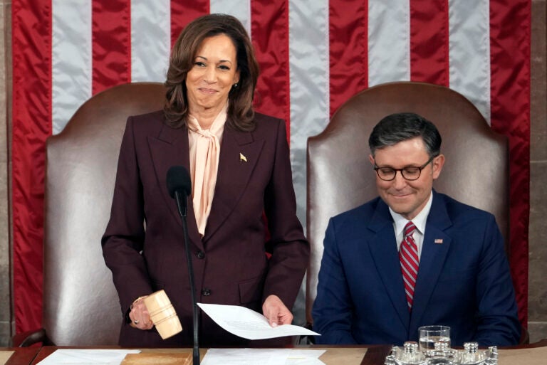 Vice President Kamala Harris reads the results