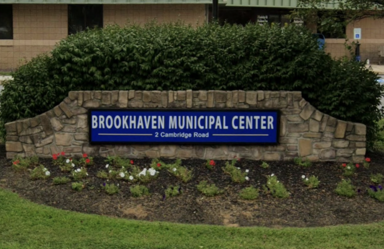 A sign for the Brookhaven Municipal Center in front of the government complex