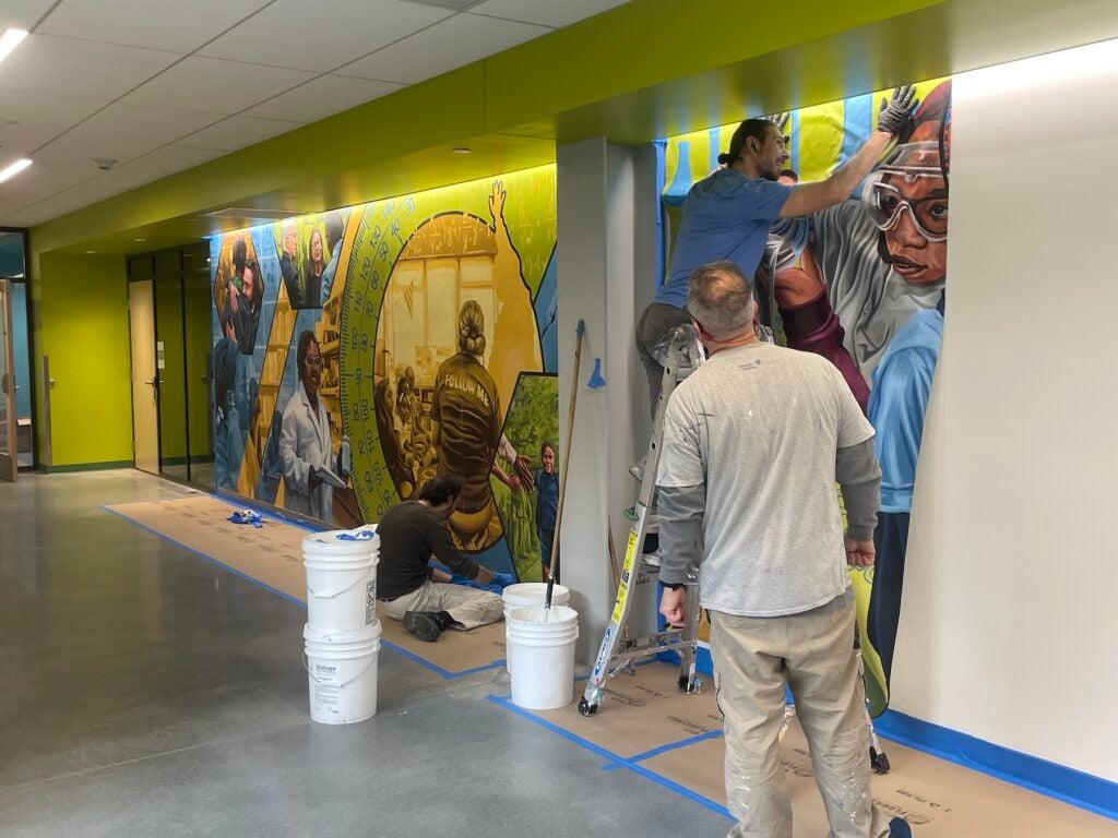 Workers at the Stem Hub's lobby