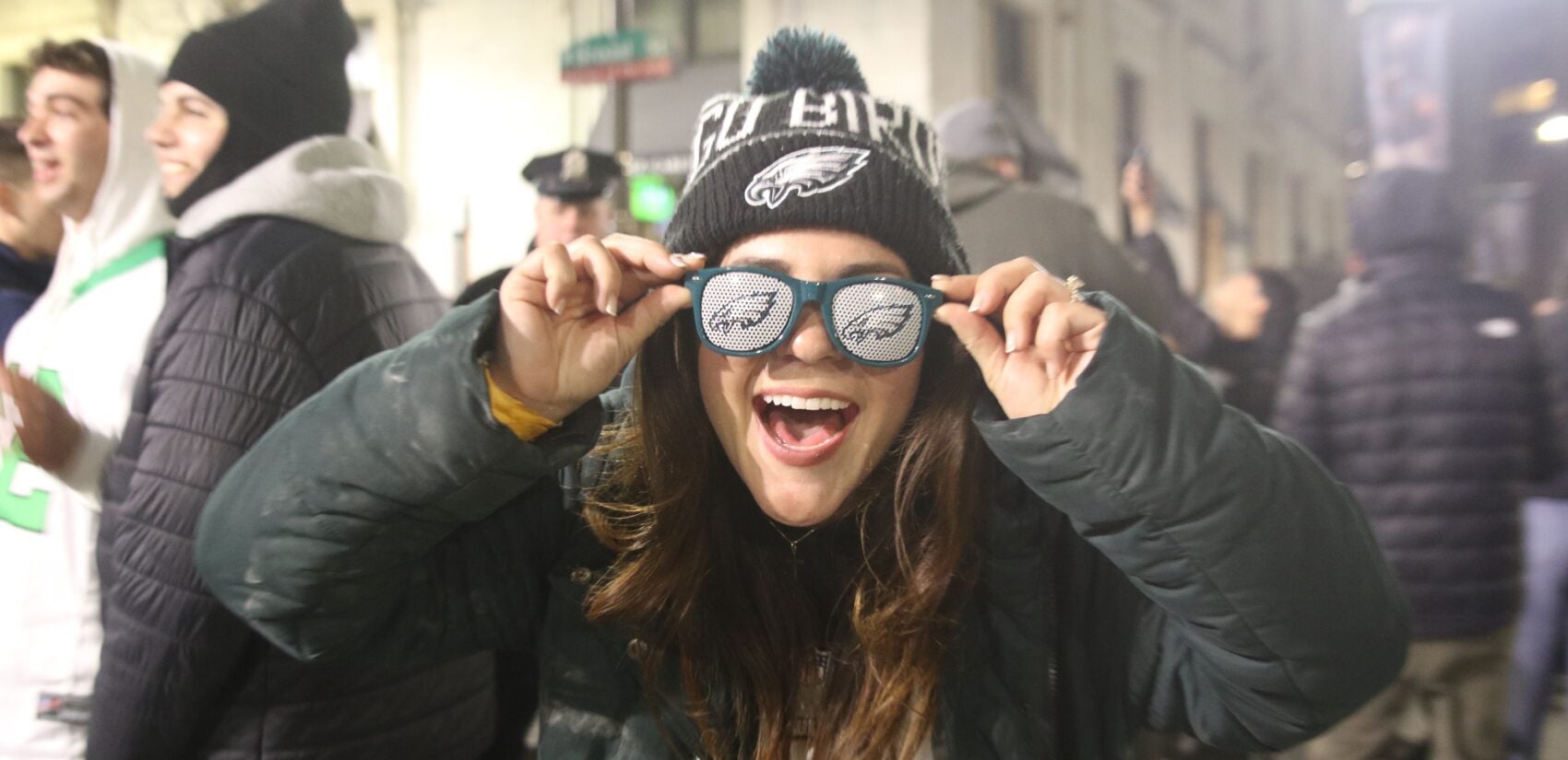 an Eagles fan with Eagles glasses