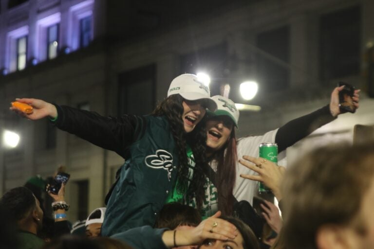 two fans smile