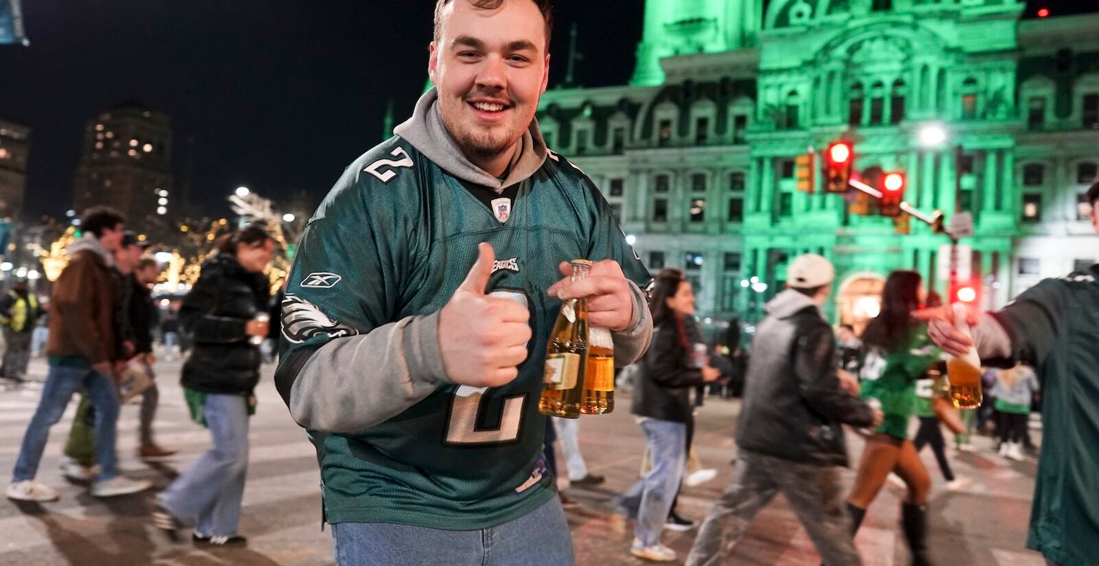 Philadelphia Eagles fans celebrate on South Broad Street in Philadelphia, Sunday Jan. 26, 2025, after the Eagles won the NFC Championship by defeating the Washington Commanders.