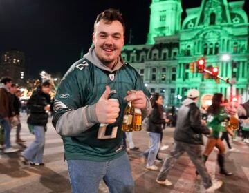 Philadelphia Eagles fans celebrate on South Broad Street in Philadelphia, Sunday Jan. 26, 2025, after the Eagles won the NFC Championship by defeating the Washington Commanders.