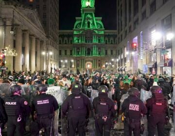 Police begin to disperse Philadelphia Eagles fans celebrating on South Broad Street in Philadelphia, Sunday Jan. 26, 2025, after the Eagles won the NFC Championship by defeating the Commanders.