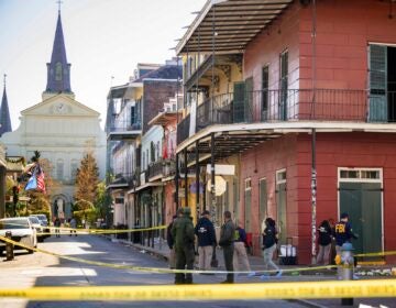 The FBI investigates the area on Orleans St and Bourbon Street by St. Louis Cathedral in the French Quarter where a suspicious package was detonated after a person drove a truck into a crowd earlier on Bourbon Street on Wednesday, Jan. 1, 2025.